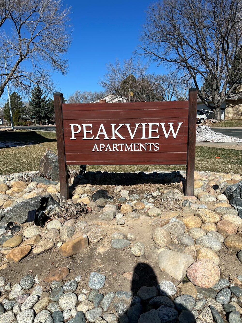 PEAKVIEW APARTMENTS Wood Panel Sign In Denver CO rotated